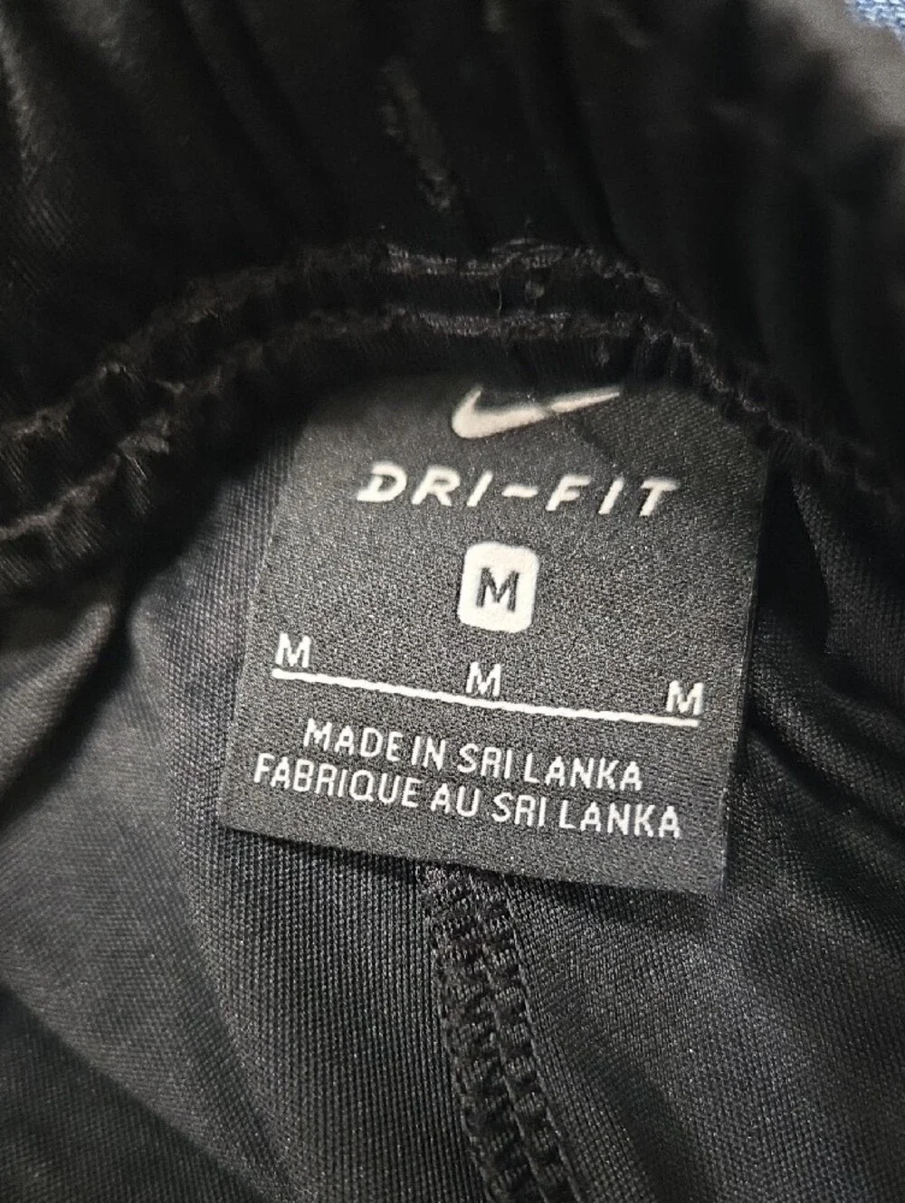 Nike Black Track Pants with White Swoosh Logo